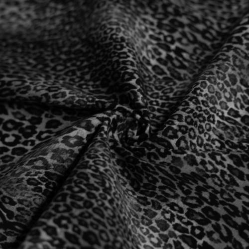 Gabardine de coton extensible nuances de gris imprimée léopard