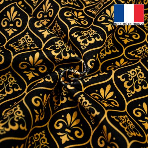 Velours noir motif ornements baroques jaune or