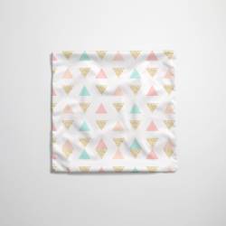 Tissu imperméable motif grands triangles pastel et paillettes