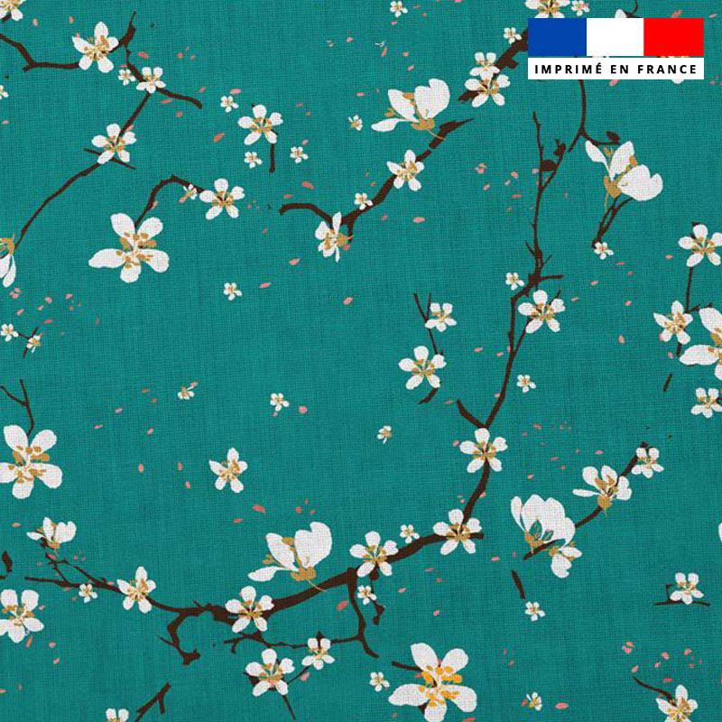 Popeline de coton bleu canard peigné motif fleur de cerisier
