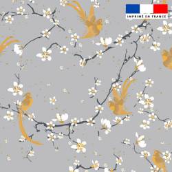 Popeline de coton grise peigné motif fleur de cerisier et oiseau