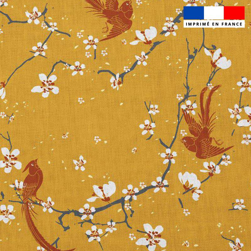 Popeline de coton moutarde peigné motif fleur de cerisier et oiseau