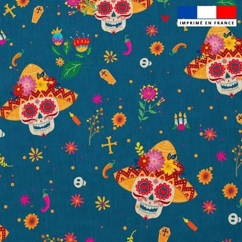 Popeline de coton bleue peigné motif tête de mort mexicaine