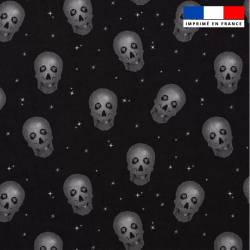 Popeline de coton peigné noire motif tête de mort argent